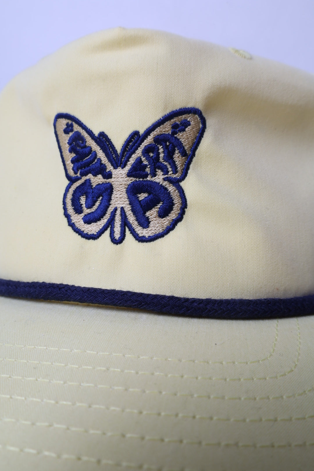 BUTTERFLY YELLOW ROPE CAP